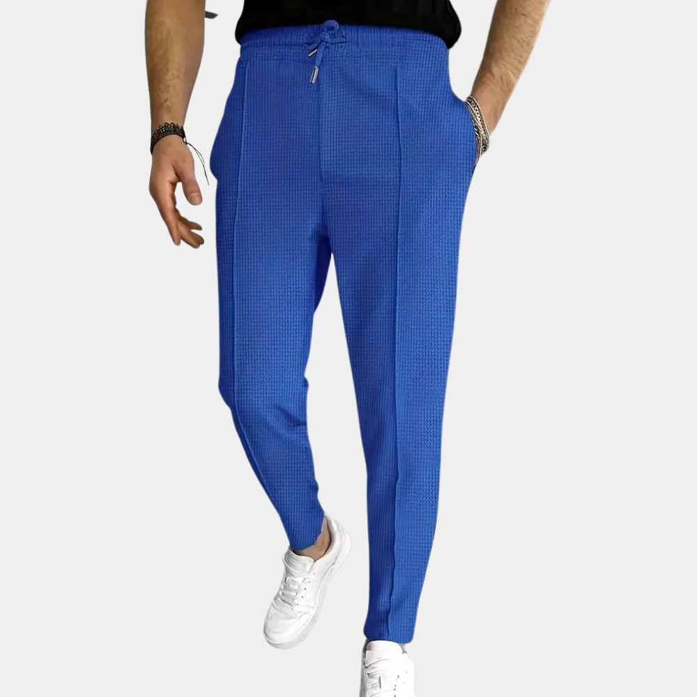 Pantalon de survêtement pour homme Mitchel avec cordon de serrage pour un confort optimal.