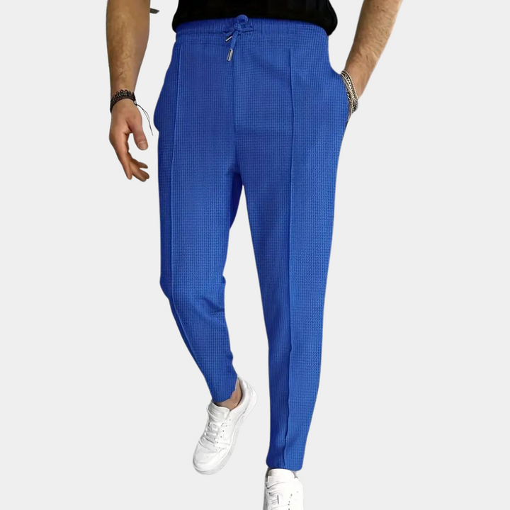 Pantalon de survêtement pour homme Mitchel avec cordon de serrage pour un confort optimal.