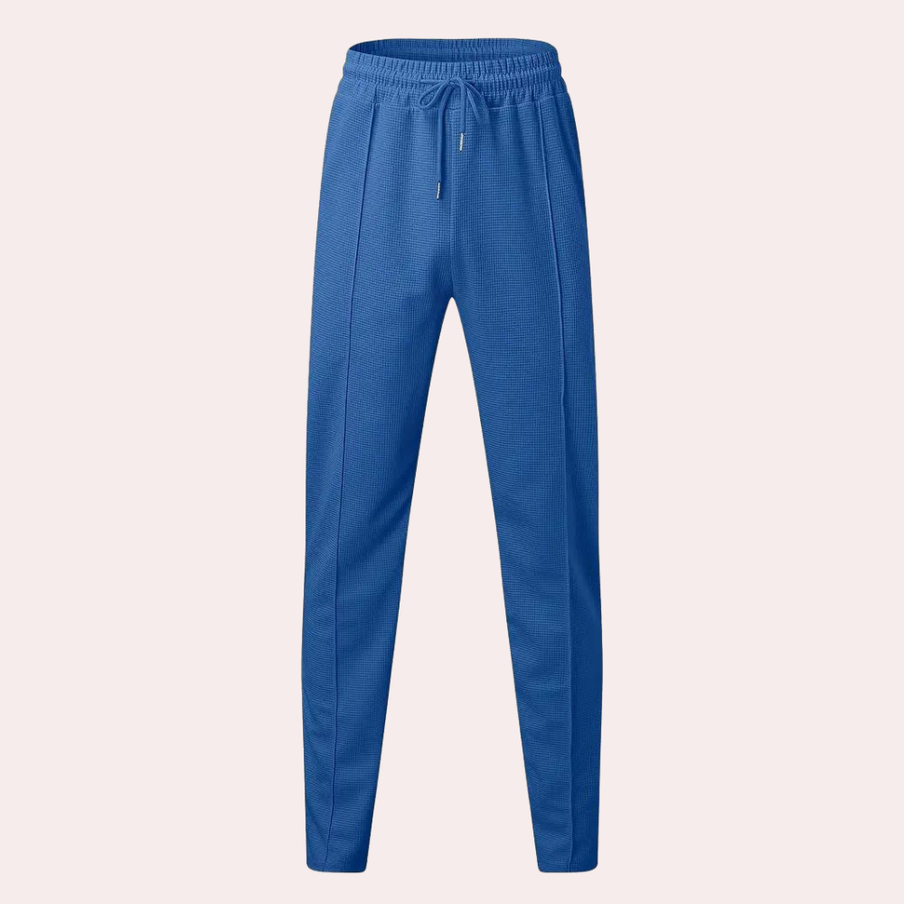 Pantalon de survêtement pour homme Mitchel avec cordon de serrage pour un confort optimal.