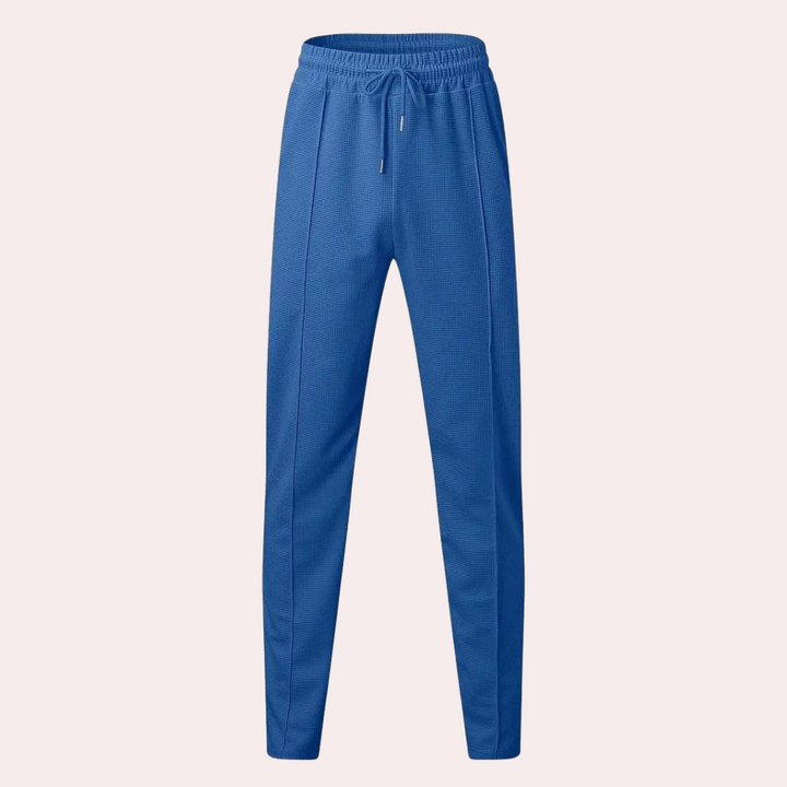 Pantalon de survêtement pour homme Mitchel avec cordon de serrage pour un confort optimal.