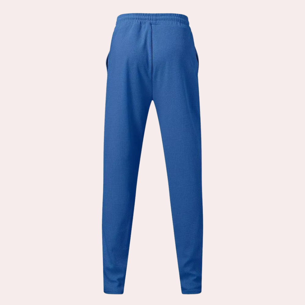 Pantalon de survêtement pour homme Mitchel avec cordon de serrage pour un confort optimal.
