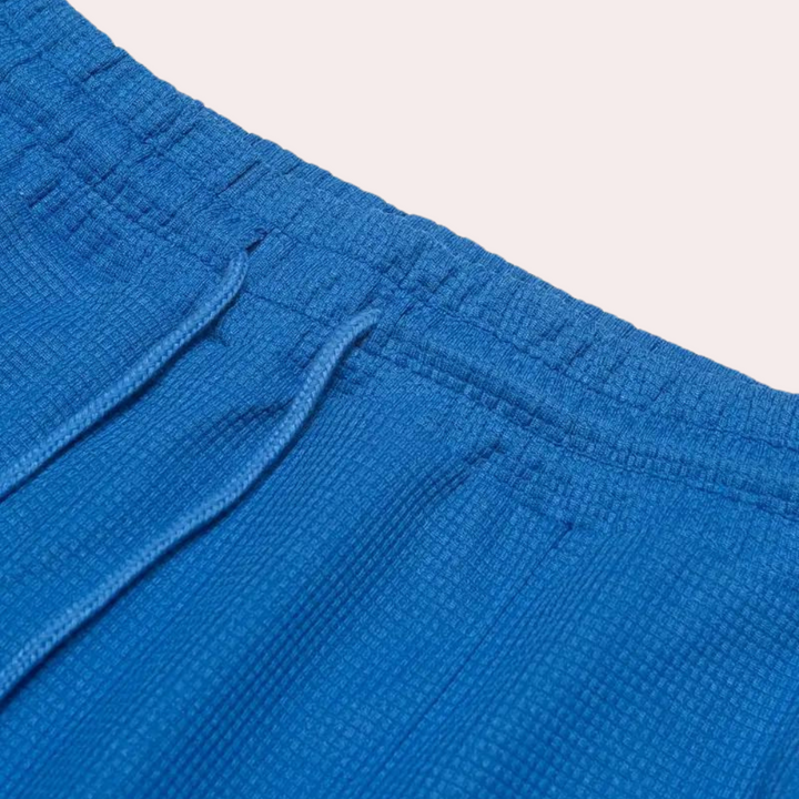 Pantalon de survêtement pour homme Mitchel avec cordon de serrage pour un confort optimal.