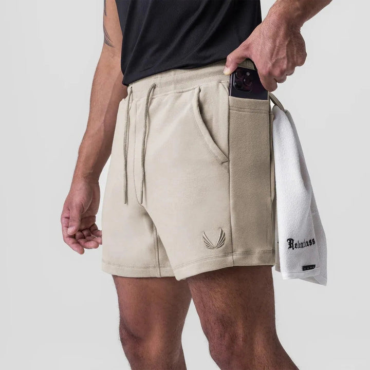 Shorts Athlétiques pour Hommes - Tissu Respirable, Waist Élastique, Poches Latérales - Parfait pour le Sport et les Jours Décontractés