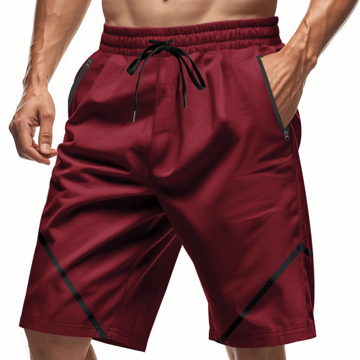 Shorts de sport pour hommes ultimes - respirants, séchage rapide et légers - coupe ample avec longueur genou et poches zippées pratiques.