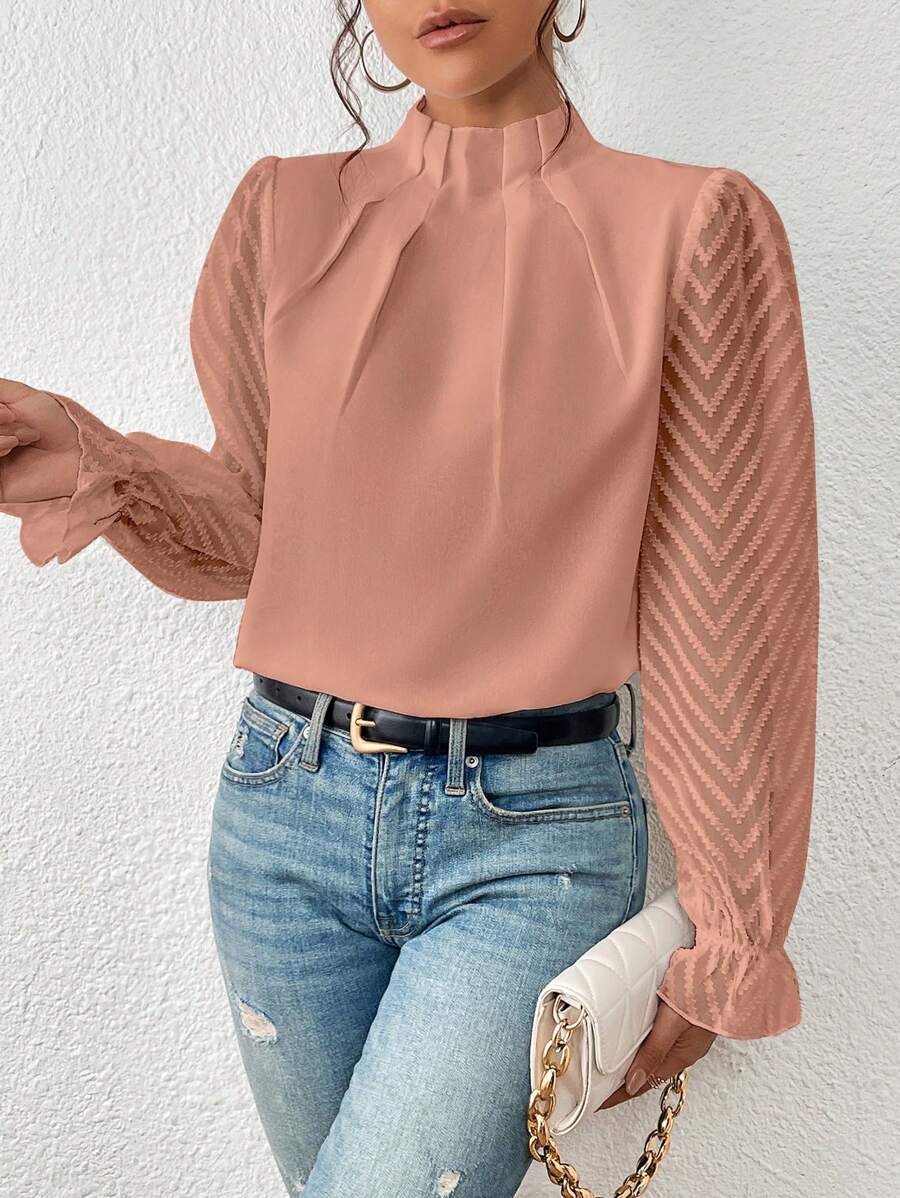 Mildred - Chemisier élégant pour femmes avec des manches transparentes stylées.