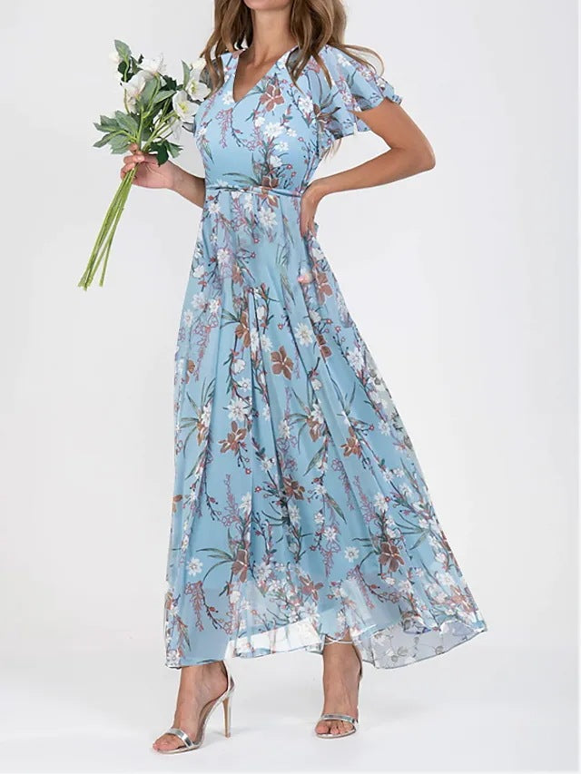 Euthalia | Robe maxi florale luxueuse avec des tissus fluides et un élégant col en V pour femmes.