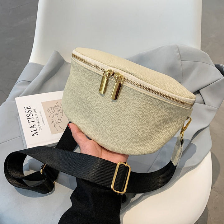 Zivora élégante banane en cuir avec une seule fermeture éclair pour un mélange parfait de fonctionnalité et d'élégance.