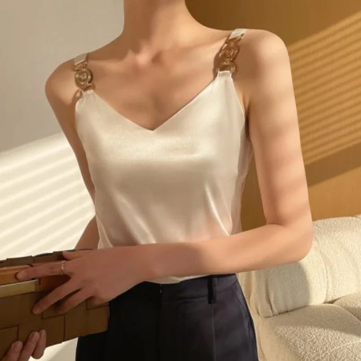 Claire - Haut élégante pour dames avec décolleté en V et détails de épaules dorés saisissants