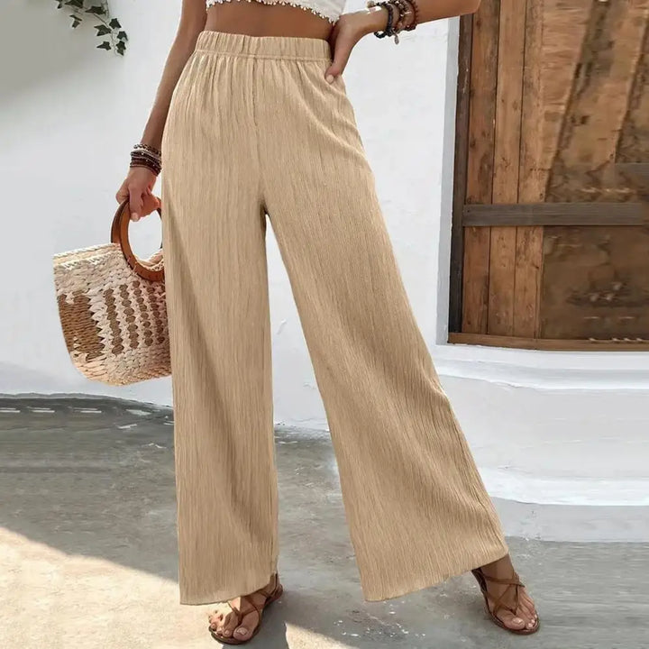 Pantalon d'été léger et confortable pour femmes, avec des jambes larges pour un look élégant et décontracté.