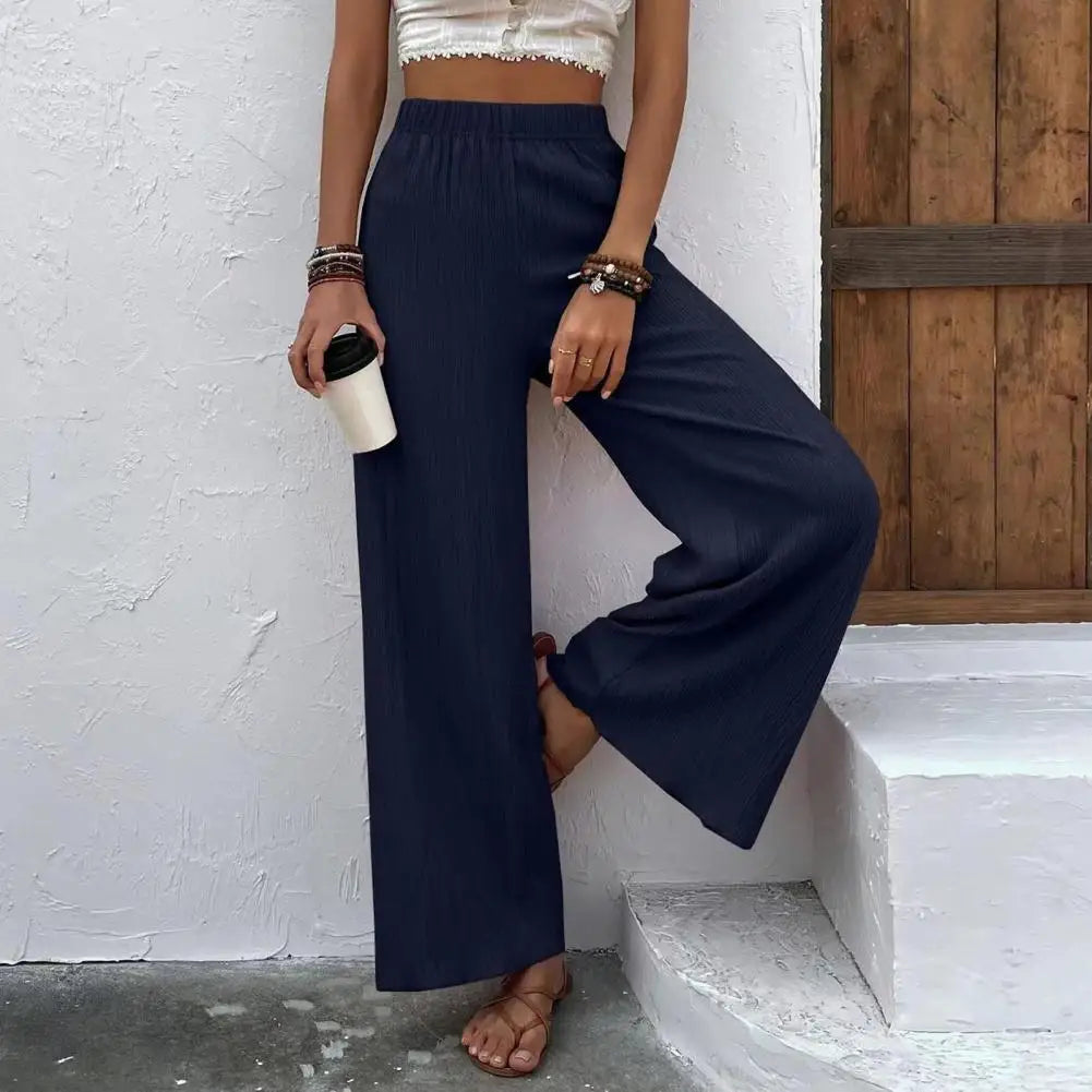 Pantalon d'été léger et confortable pour femmes, avec des jambes larges pour un look élégant et décontracté.
