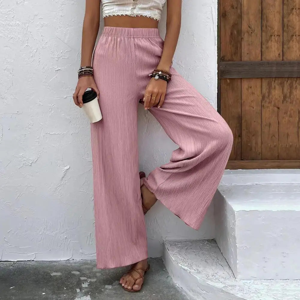 Pantalon d'été léger et confortable pour femmes, avec des jambes larges pour un look élégant et décontracté.