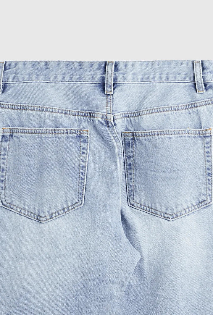 Jeans Slim Fit Élégants en Bleu avec un Look Usé Unique