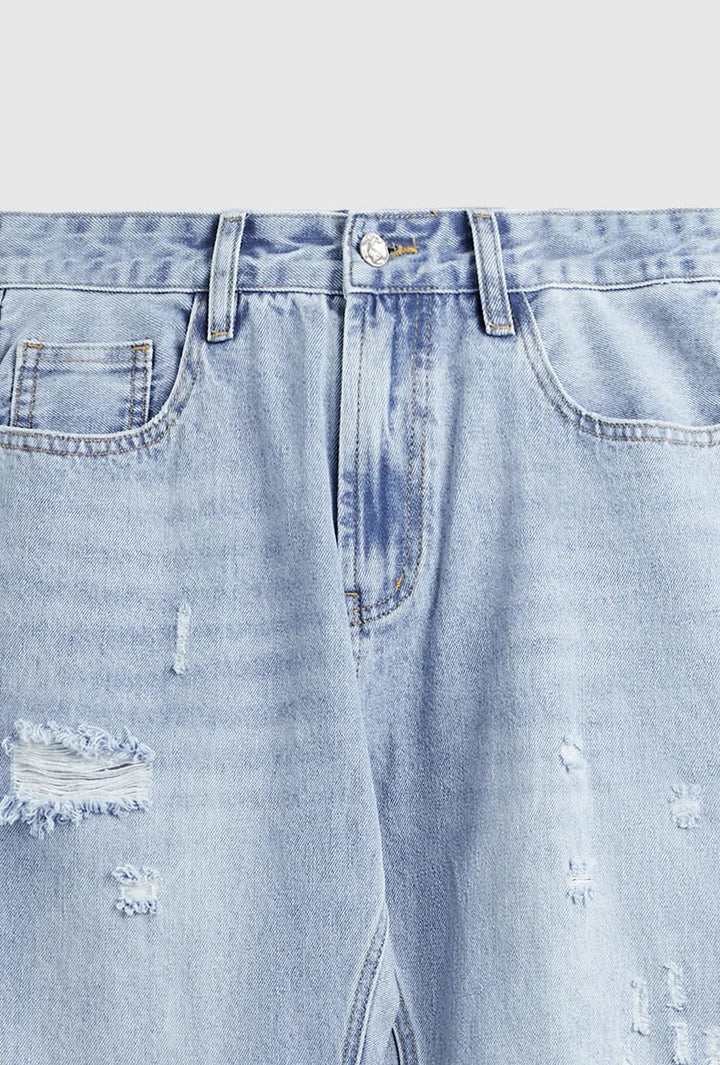 Jeans Slim Fit Élégants en Bleu avec un Look Usé Unique