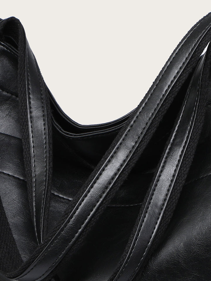 Nova - Élégante sac en cuir avec fermeture par bouton-pression et espace de rangement supplémentaire.