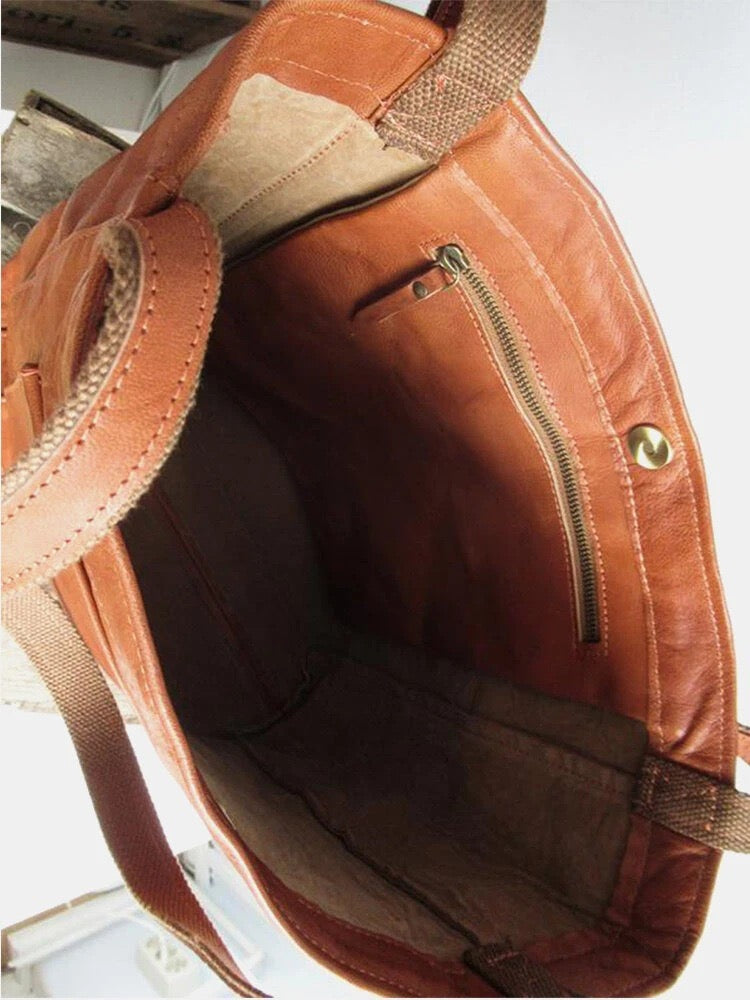 Nova - Élégante sac en cuir avec fermeture par bouton-pression et espace de rangement supplémentaire.