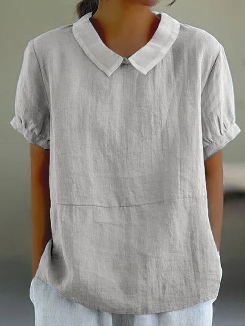 Blouse pour dames Marie élégante avec un col rond chic et des manches courtes confortables.