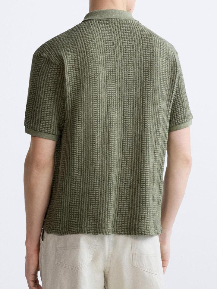 Polo tricotée élégante avec fermeture éclair pour un look chic