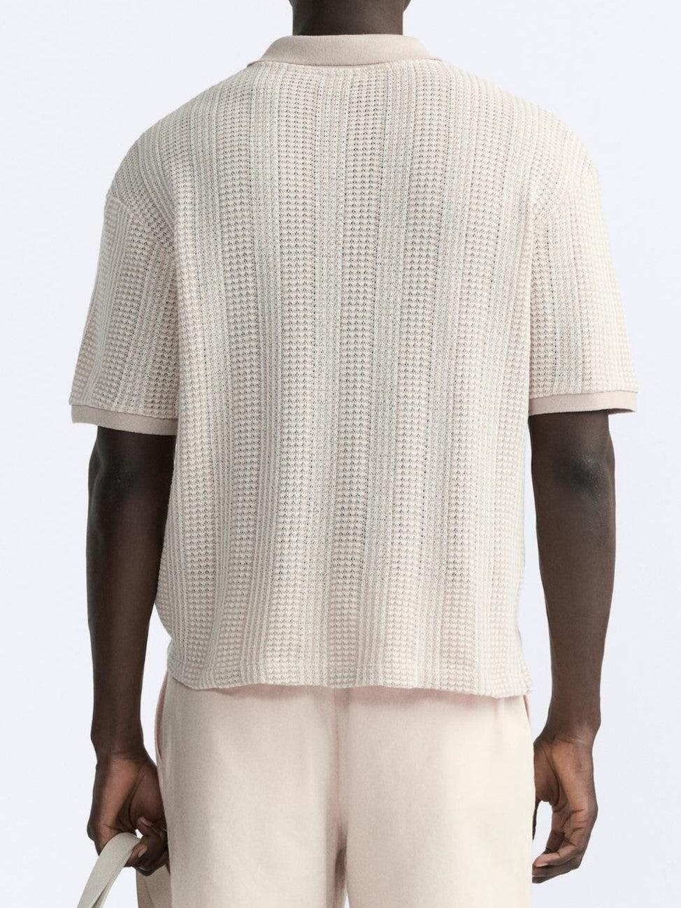 Polo tricotée élégante avec fermeture éclair pour un look chic