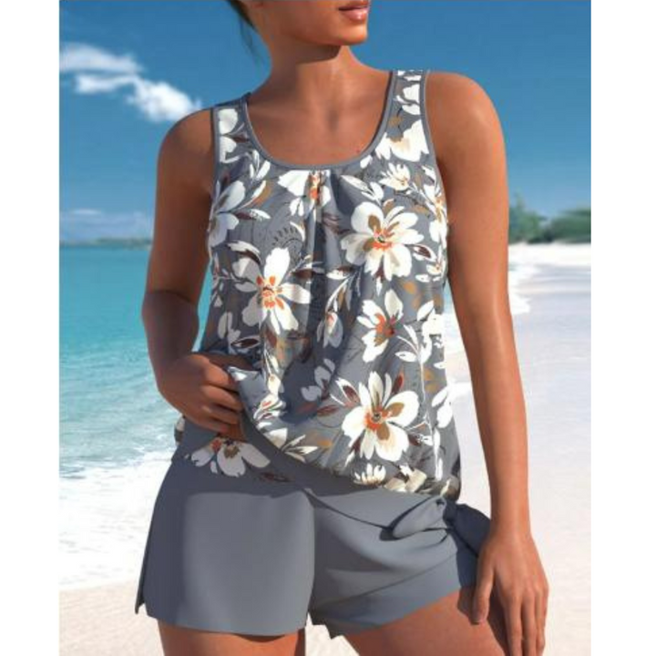 Maillot de bain d'été élégante pour femme avec détail floral et pantalon confortable pour un look estival chic.
