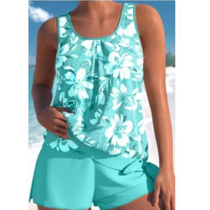 Maillot de bain d'été élégante pour femme avec détail floral et pantalon confortable pour un look estival chic.