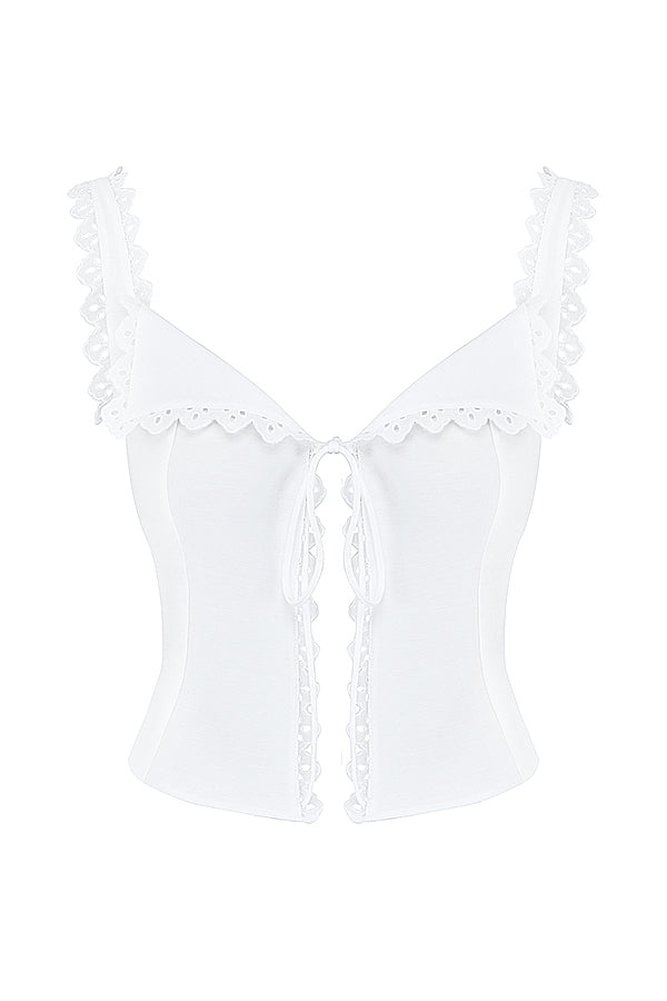 Top court en dentelle blanche chic avec un nœud élégant et une mini-jupe A-ligne en lin stylée.