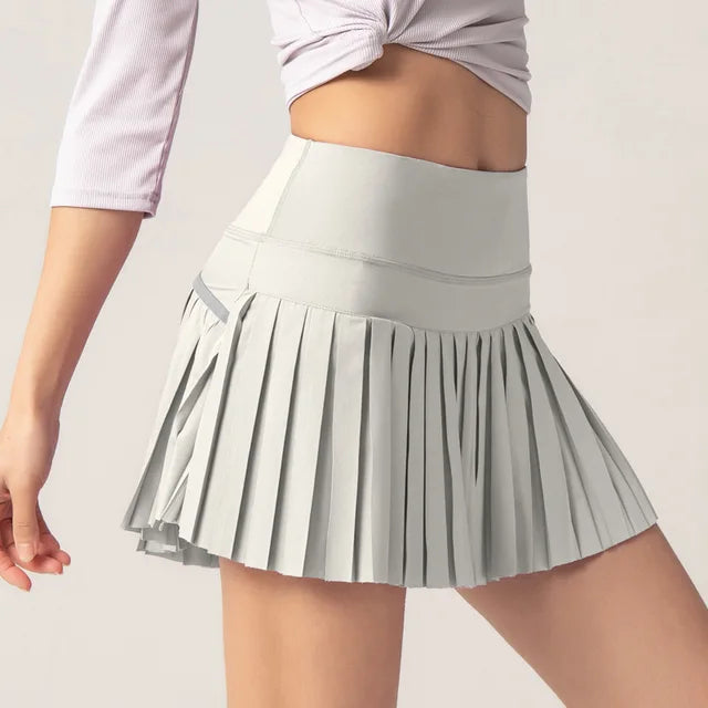 Flor - Jupe Mini Sportive Élégante avec Poche Intérieure Pratique