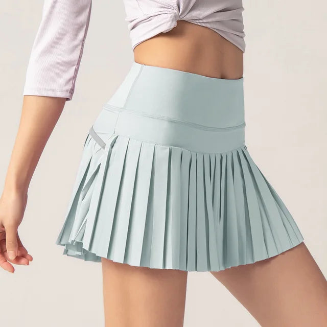 Flor - Jupe Mini Sportive Élégante avec Poche Intérieure Pratique