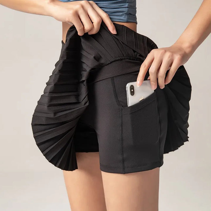 Flor - Jupe Mini Sportive Élégante avec Poche Intérieure Pratique