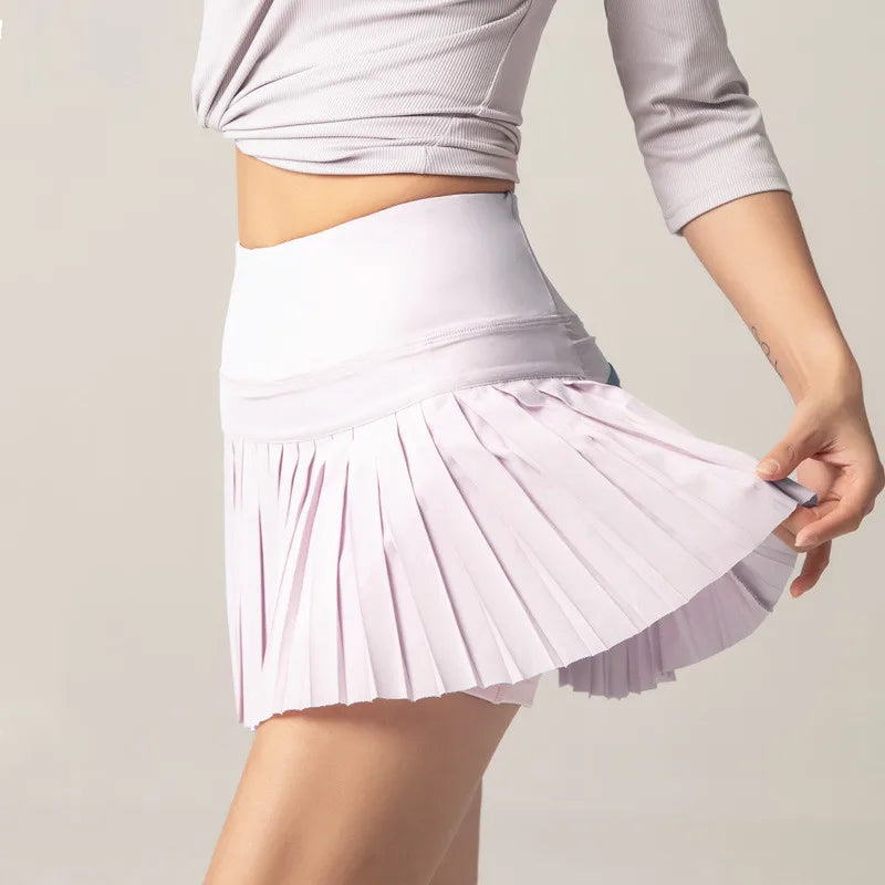 Flor - Jupe Mini Sportive Élégante avec Poche Intérieure Pratique