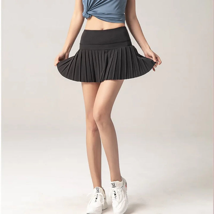 Flor - Jupe Mini Sportive Élégante avec Poche Intérieure Pratique
