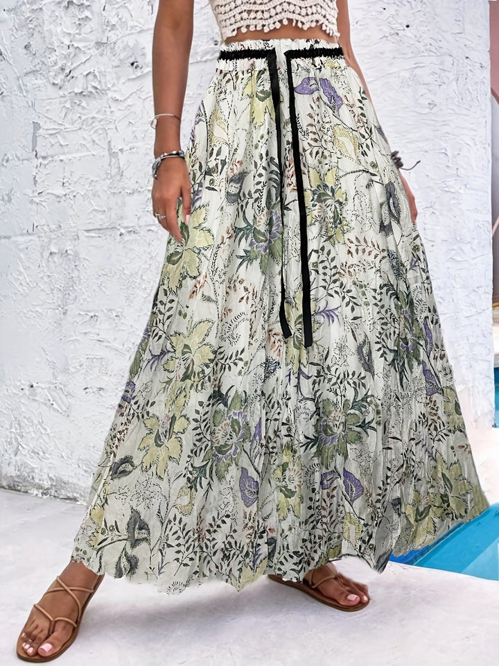Dressing gown maxi estivale avec des pois saisissants et un élégant nœud pour un look frais et stylé.