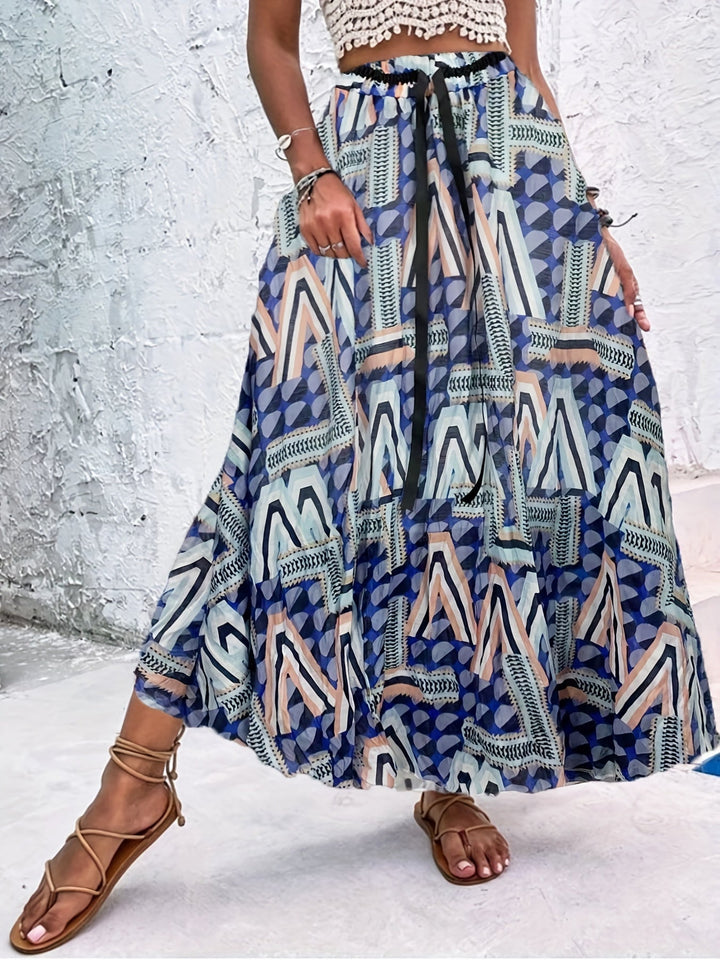 Dressing gown maxi estivale avec des pois saisissants et un élégant nœud pour un look frais et stylé.