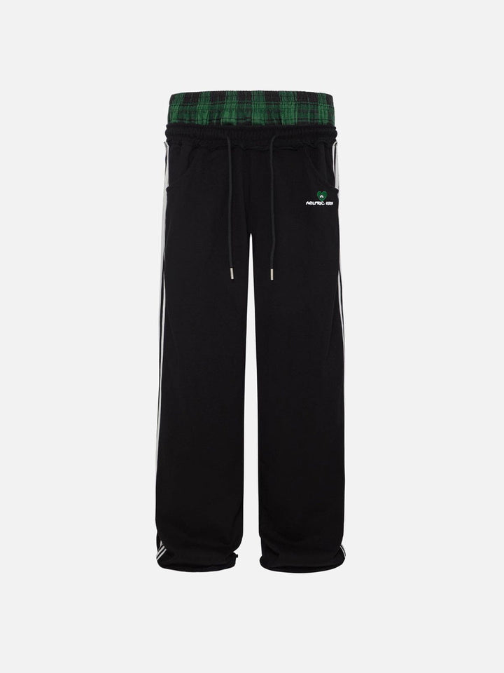 Jazzlyn - Pantalon de jogging grise chic avec une luxueuse ceinture double pour confort et style.