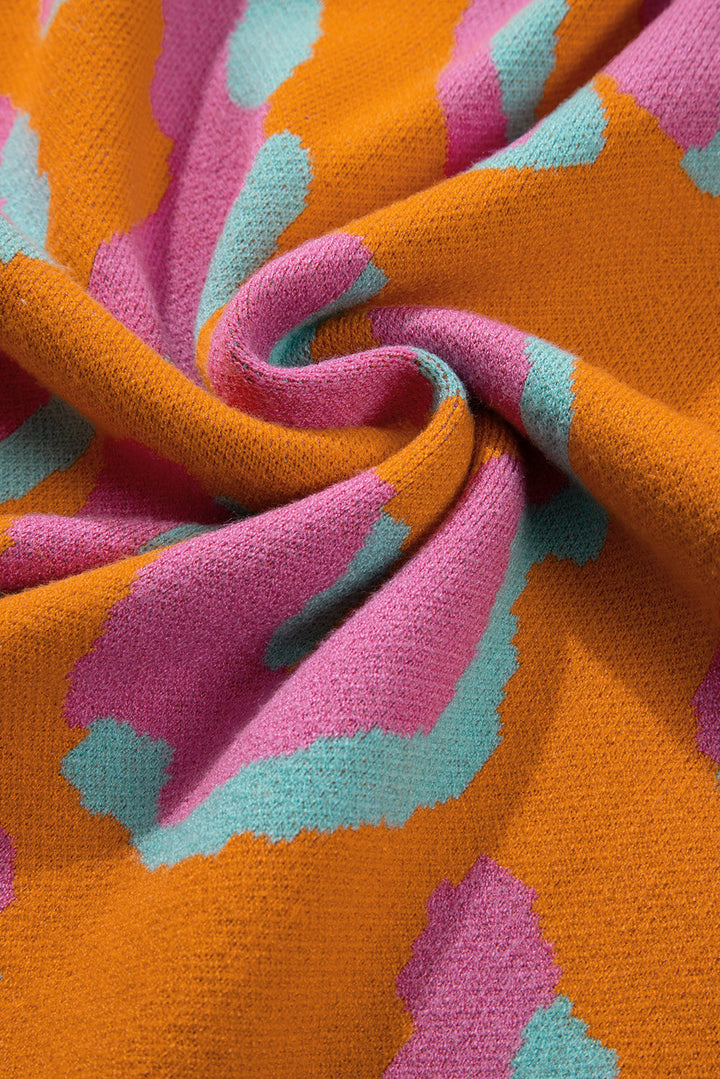 Elouise - Pull orange léopard tendance pour un look remarquable