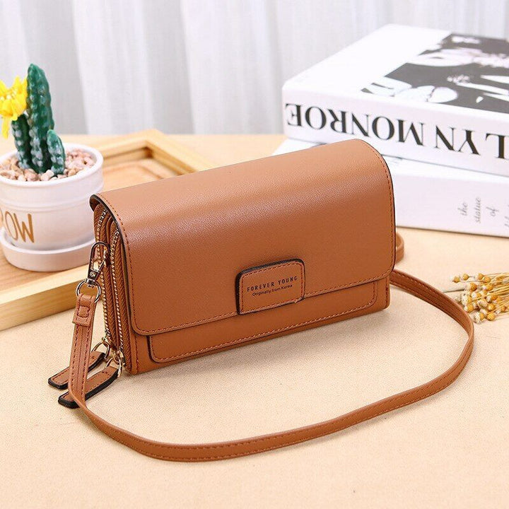 Sac en cuir synthétique élégant et classique pour un style intemporel.