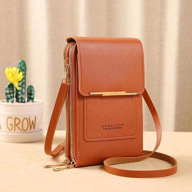 Sacoche crossbody compact et élégante avec un porte-carte multifonction pratique.