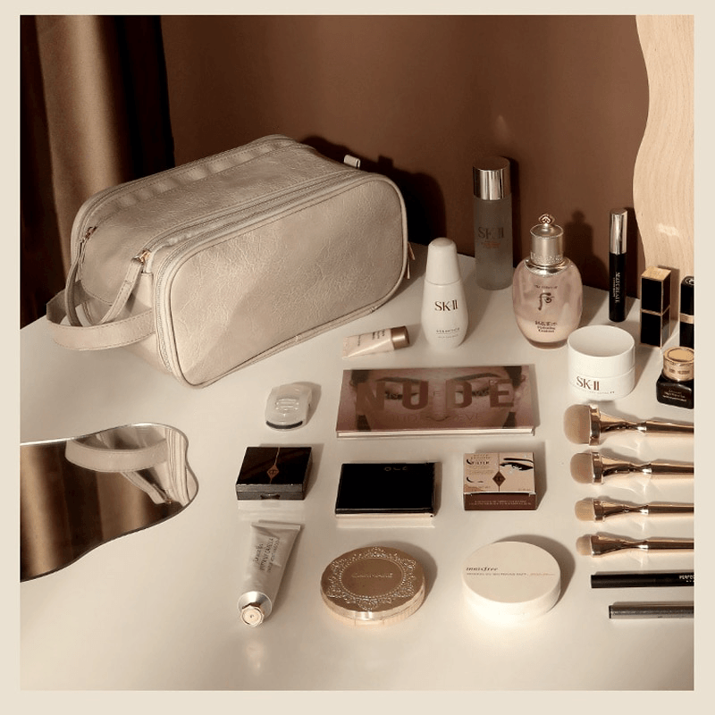 Trousse de maquillage de luxe avec double fermeture à glissière et compartiments pratiques organisés pour un look de toilette élégant