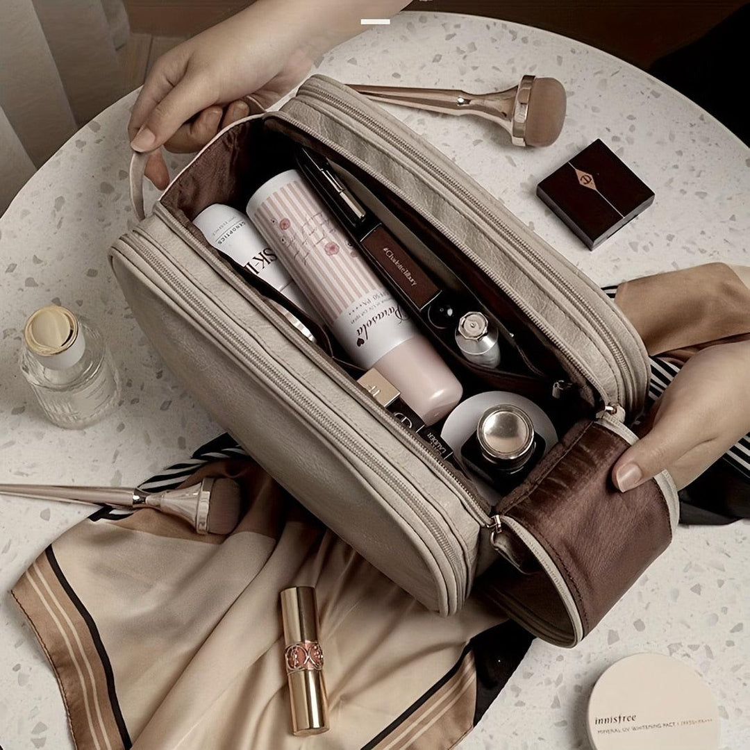 Trousse de maquillage de luxe avec double fermeture à glissière et compartiments pratiques organisés pour un look de toilette élégant