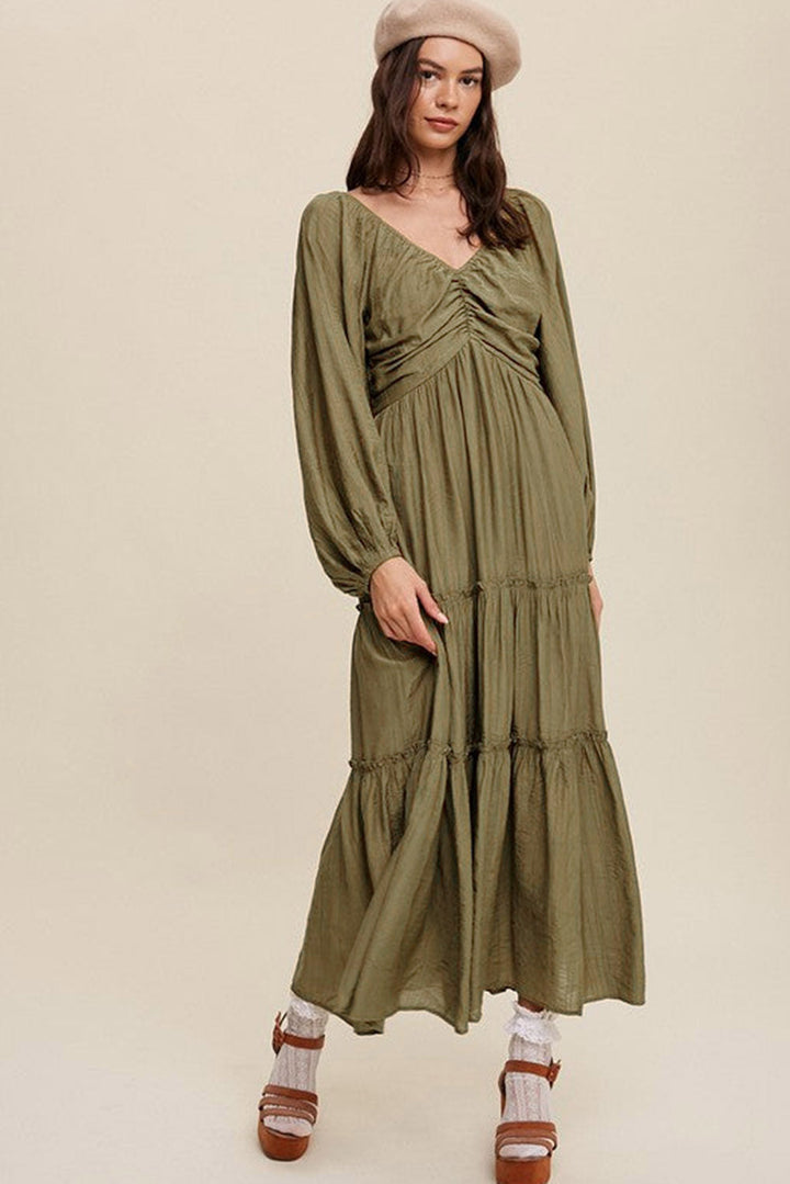 Dressing gown maxi élégante Alessia à décolleté en V avec détail de noeud et effet frange pour un look sophistiqué.
