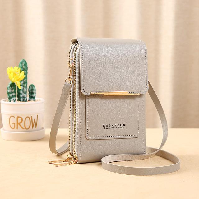 Sacoche crossbody compact et élégante avec un porte-carte multifonction pratique.