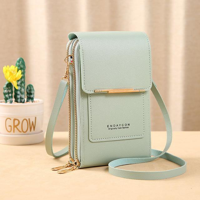 Sacoche crossbody compact et élégante avec un porte-carte multifonction pratique.