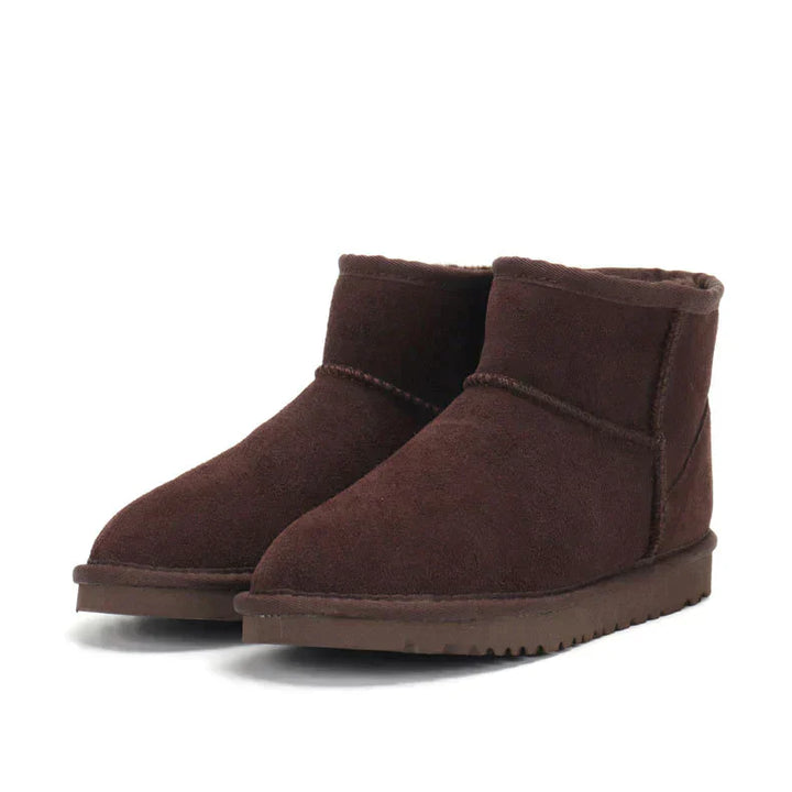 Bottines élégantes en suede doublées pour femmes, alliant confort et style pour l'hiver.