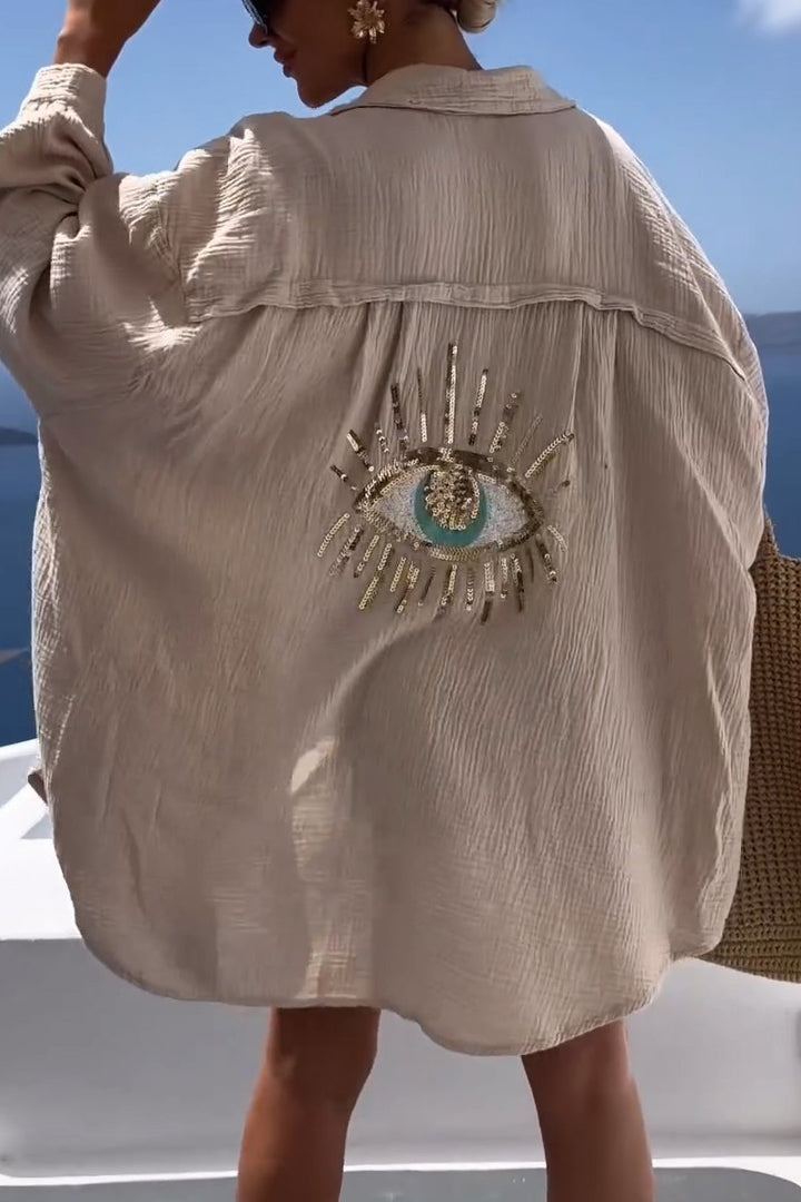 Evi | Chemise décontractée tendance avec un design captivant de motifs oculaires