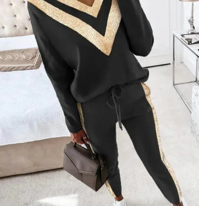 Jogging noir chic avec des accents dorés élégants pour les femmes