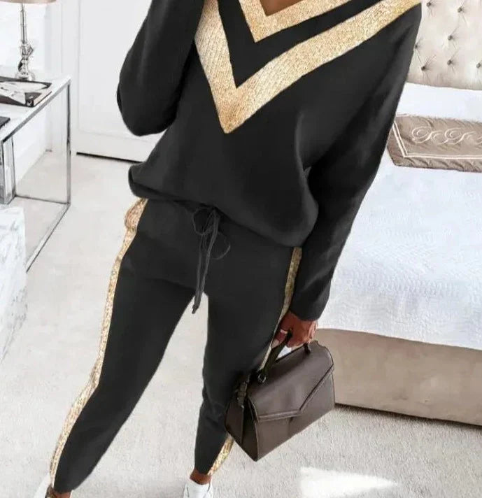 Jogging noir chic avec des accents dorés élégants pour les femmes