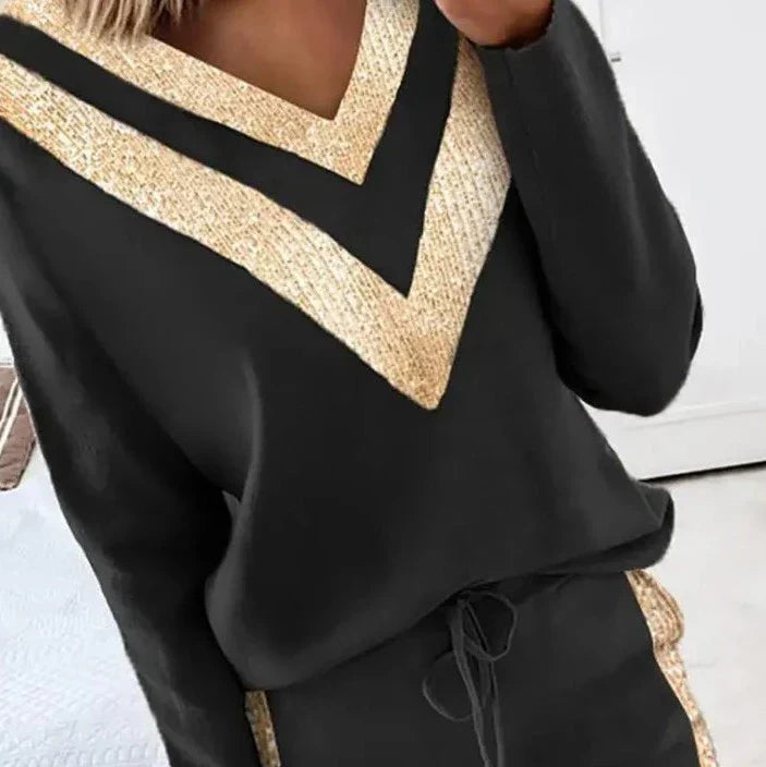 Jogging noir chic avec des accents dorés élégants pour les femmes