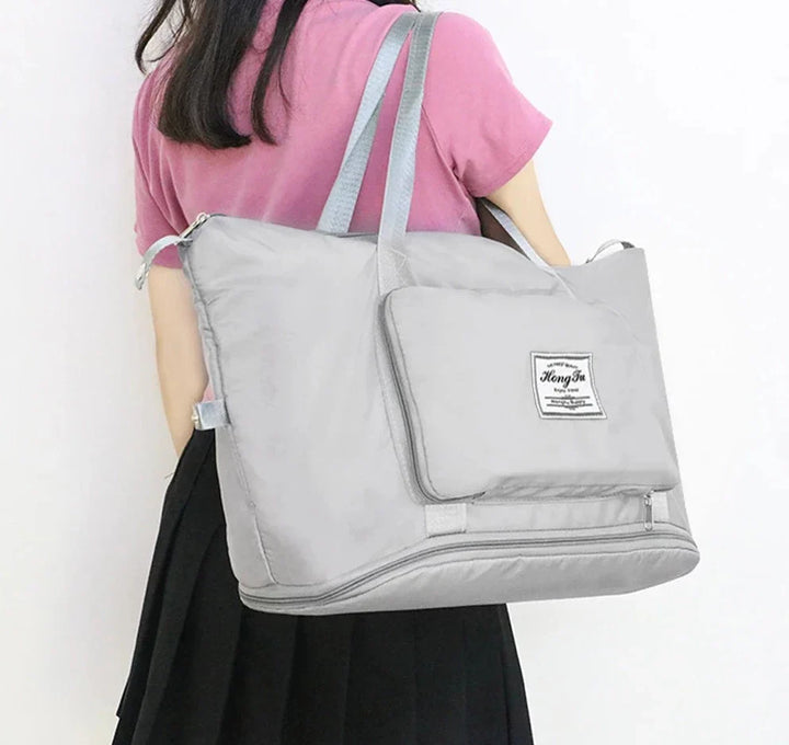 Grand sac de voyage pliable pour faciliter le transport et le stockage