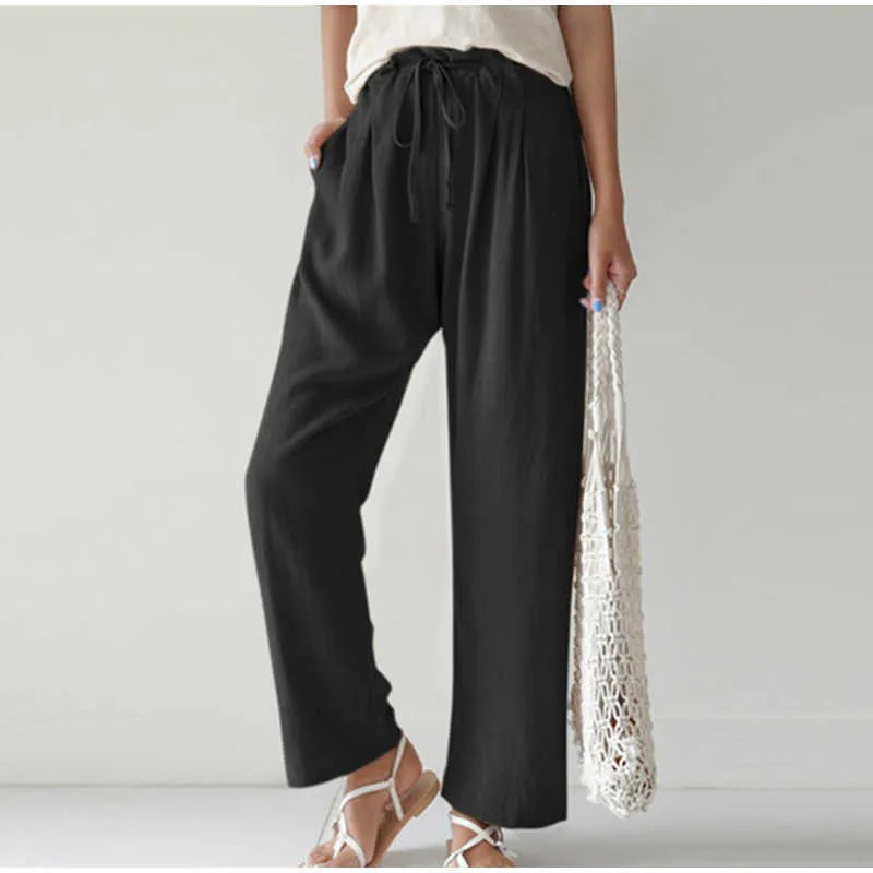 Gretel - Pantalon respirant avec taille élastique et poche plissée tendance sur des jambes évasées