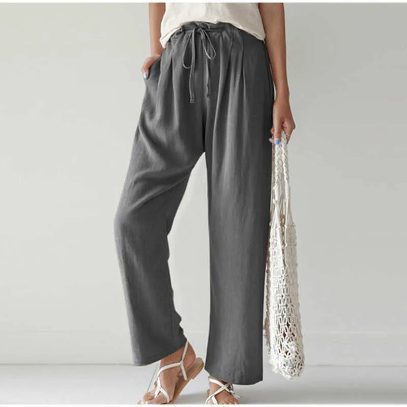 Gretel - Pantalon respirant avec taille élastique et poche plissée tendance sur des jambes évasées