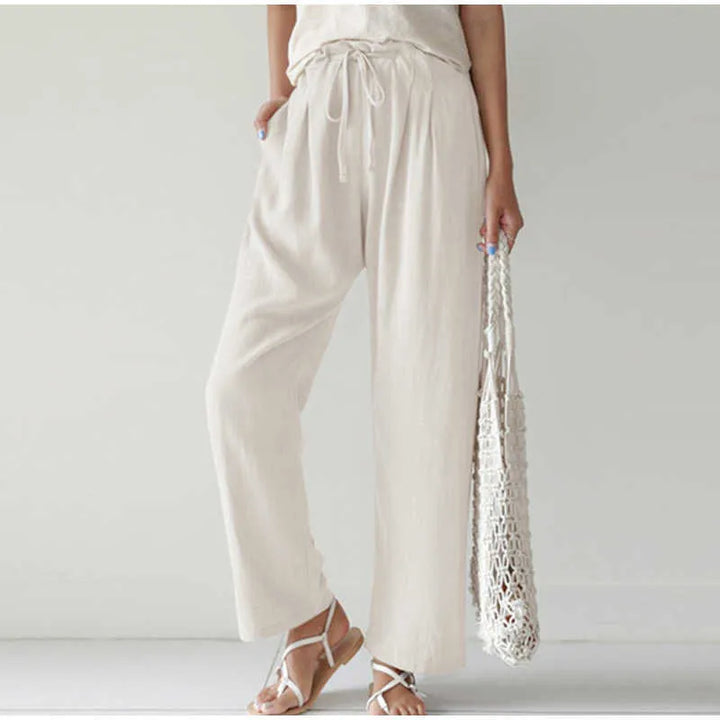 Gretel - Pantalon respirant avec taille élastique et poche plissée tendance sur des jambes évasées
